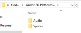 La imatge mostra el moll FileSystem del projecte Godot 2D Platformer, mostrant dues carpetes importades: "Audio" i "Sprites", que corresponen a les carpetes d'actius descrites a la lliçó per emmagatzemar efectes de so i actius visuals respectivament; aquestes són les carpetes inicials importades abans de crear carpetes addicionals "Guions" i "Escenes" segons les instruccions.