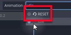 Aquesta imatge destaca el botó "RESET" a l'editor d'animació de Godot, situat dins dels controls de pista per a la propietat de textura del node Sprite sota l'animació "inactiva"; el botó presenta una icona de fletxa circular i s'etiqueta "RESET", que indica la seva funció per restablir o esborrar els valors dels fotogrames clau per a aquesta pista, una característica activada en crear la pista mitjançant la casella de selecció "Crea RESTABILITZAR pistes" tal com s'ha indicat anteriorment.