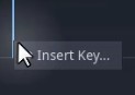 La imatge mostra un primer pla de l'editor de la línia de temps d'AnimationPlayer de Godot, on el cursor del ratolí passa per sobre del botó "Insereix clau..." situat a la marca de 0,3 segons d'una pista d'animació, indicant que l'usuari està a punt d'inserir un fotograma clau per a l'animació "volar" de l'enemic, que s'anomenava anteriorment i s'està configurant per definir el comportament visual del punt de temps específic en l'animació.