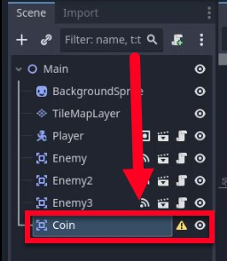 Aquesta imatge mostra el tauler Escena del motor Godot amb el node "Moneda" seleccionat, ressaltat per una fletxa vermella i una icona d'advertència que indica un problema potencial; el node Coin és un fill d'Area2D a Main, juntament amb altres nodes com Player i Enemy, i la seva selecció correspon al pas de la lliçó de configurar l'escena de la moneda abans de programar el seu comportament d'animació i col·lisió.