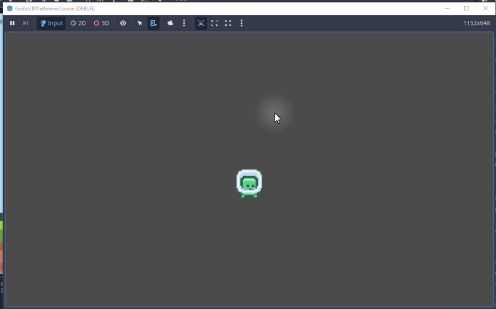 A la finestra de visualització de l'editor 2D de Godot Engine durant una sessió de depuració titulada "Godot2DPlatformerCourse (DEBUG)", un petit personatge alienígena verd d'art de píxels amb un casc blanc es centra en un fons gris fosc, que representa l'esprit del jugador; a sobre d'ell, una lleugera forma de col·lisió circular és visible, que indica la zona activa de l'Area2D per al node EndFlag. Això confirma la ubicació de la bandera i la configuració de col·lisió tal com es descriu a la lliçó, on el jugador ha d'entrar a aquesta àrea per activar la lògica de transició de l'escena mitjançant el senyal body_entered connectat.