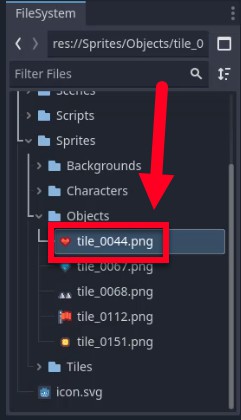 La imatge mostra el tauler FileSystem d'un editor de motors de jocs, destacant el fitxer "tile_0044.png" situat a la ruta res://Sprites/Objects/, que s'identifica com la textura del cor utilitzada per a la visualització de la salut de la IU; una fletxa vermella apunta a aquest fitxer, que indica que s'ha de seleccionar i arrossegar al node Heart TextureRect tal com s'indica a la lliçó per assignar l'actiu visual correcte per a l'indicador de salut del jugador.