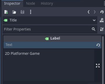 Aquesta imatge mostra el panell Inspector de l'editor Godot amb el node Etiqueta "Títol" seleccionat, mostrant les seves propietats a la secció "Text"; el camp "Text" està definit en "Joc de plataformes 2D", que correspon a la instrucció de la lliçó per assignar aquest text del títol al node Etiqueta del menú per mostrar-lo a la pantalla.