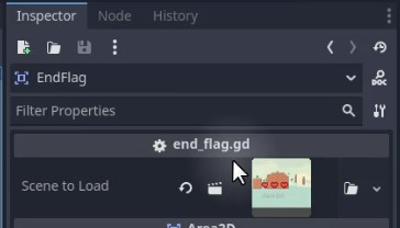 Al tauler d'inspector de l'editor Godot, sota el node "EndFlag", es mostra el recurs de l'script "end_flag.gd" amb una icona d'engranatge que indica que es pot editar; al costat, la propietat "Escena per carregar" mostra una vista prèvia en miniatura d'una escena amb un cotxe vermell sobre un fons d'herba, cosa que suggereix que aquest és el nivell o l'escena que es carregarà quan s'activa la bandera final, d'acord amb la configuració de la lògica de progressió del joc al tutorial.