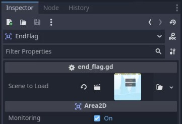 Al tauler d'inspector de l'editor Godot, es selecciona el node "EndFlag", que mostra el seu recurs d'script "end_flag.gd" i una propietat "Escena per carregar" que fa referència a una miniatura de vista prèvia de l'escena, probablement el nivell o l'escena següent que es carregarà en activar aquesta marca. A continuació, es mostra un node "Area2D" a Monitorització amb la casella de selecció activada, que indica que està configurat per detectar col·lisions o solapaments, que es poden utilitzar per activar la condició final o la transició d'escena al joc. Aquesta configuració s'alinea amb la implementació de la lògica de joc per fer la transició entre escenes, com ara completar un nivell o assolir un objectiu.